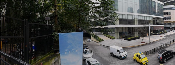 未拆前由擋墻形成的兩邊景象對比。九龍城市更新公司供圖