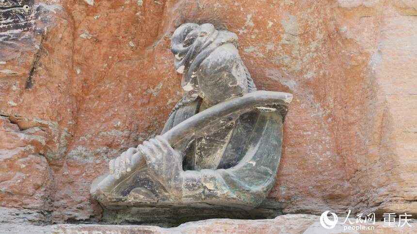 大足石刻“吹笛女”造像。人民網 曹欣悅攝